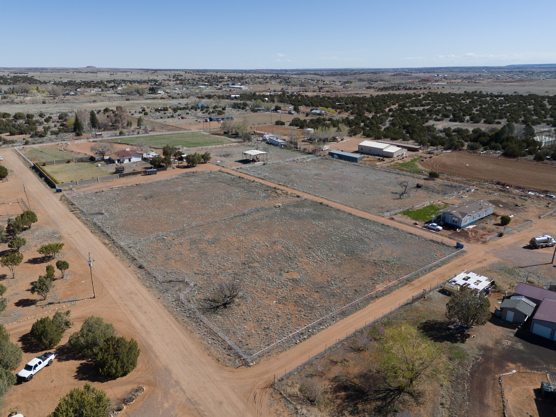Aerial view of the High Country homestead and its pastures in Taylor, Arizona
